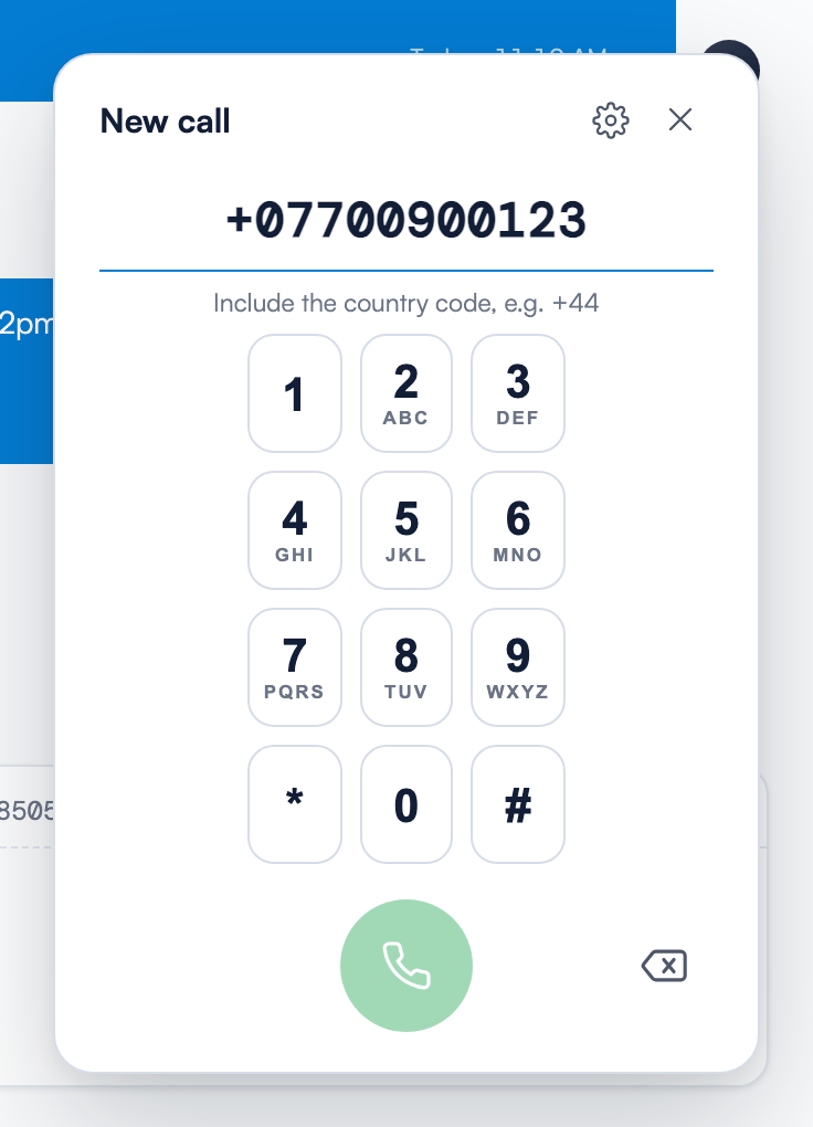 The New call dialpad card with a number typed without a country code, the hint Include the country code, e.g. +44 below the input, and the round green call button
