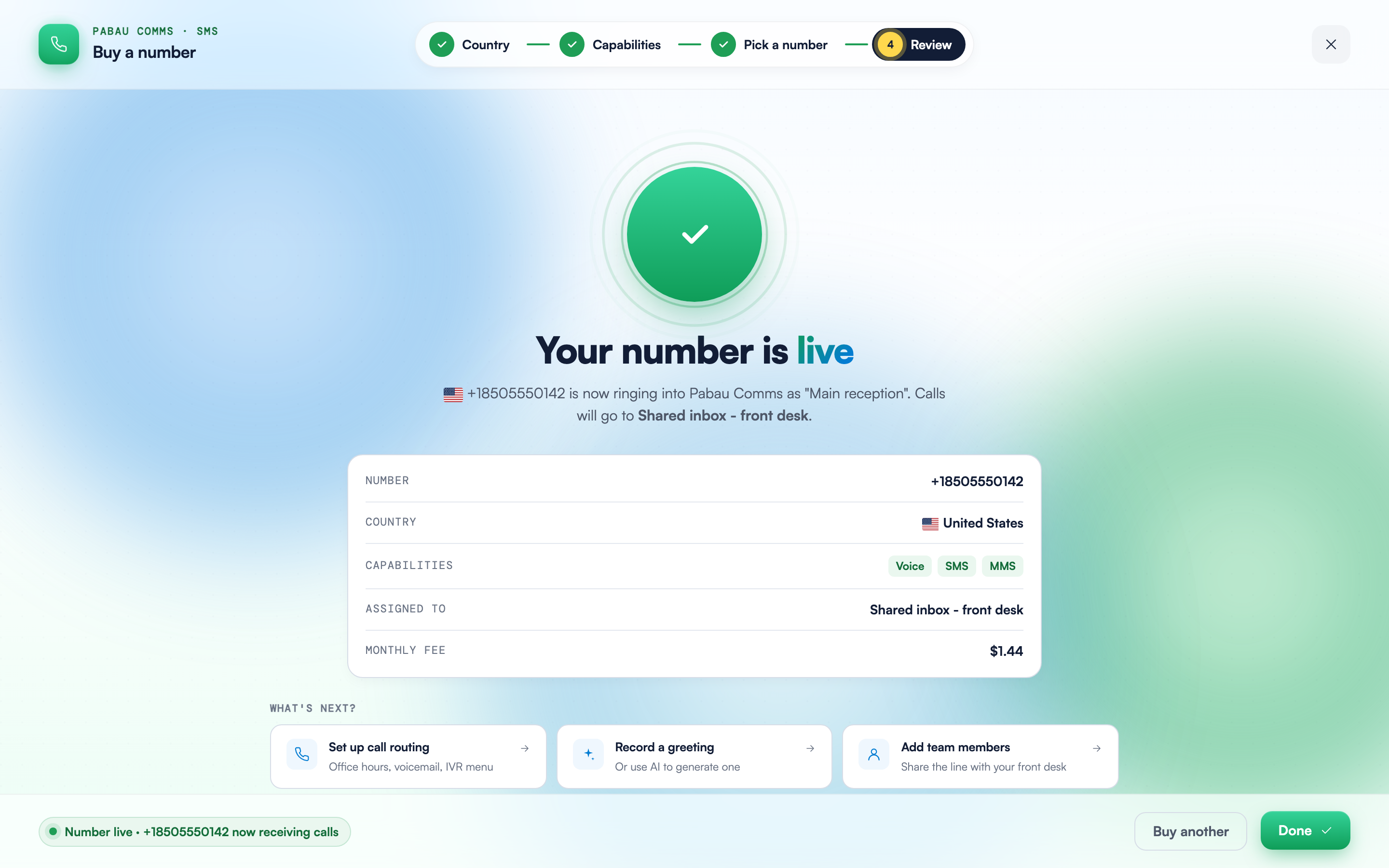 The success screen reading "Your number is live" with a summary card showing the number, country, capability chips, assignee and monthly fee